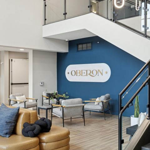 Oberon Magazine and dried flowers on a stone coffee table