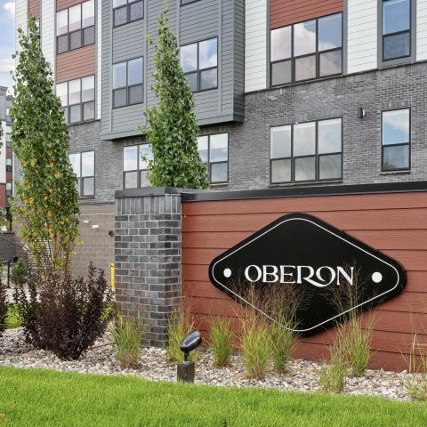 Oberon Magazine and dried flowers on a stone coffee table